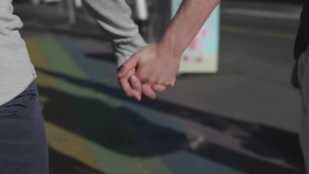 Stock Video Holding Hands Over Rainbow Crosswalk Animated Wallpaper - Free Download