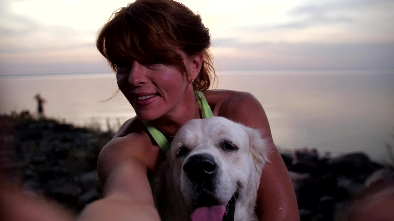 Free Video Stock taking a photo with her dog Live Wallpaper - Free Download