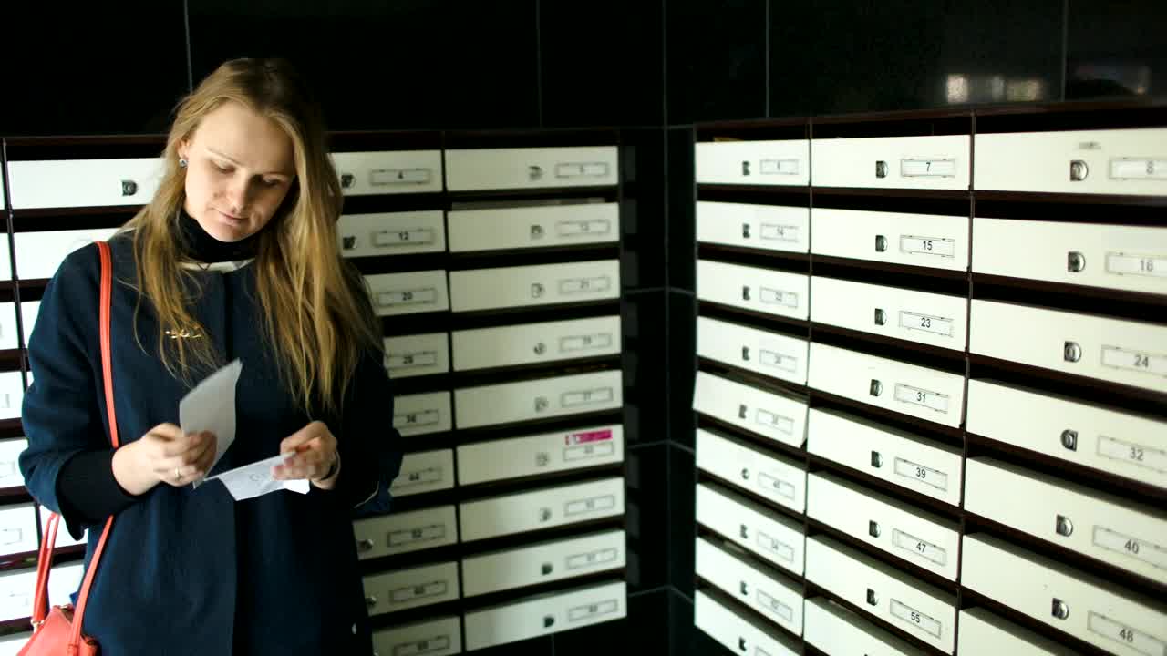 Stock Footage Woman Checking Her Mail Live Wallpaper - Free Download