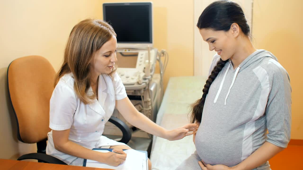 Stock Video Pediatrician Checks His Patients Pregnancy Live Wallpaper - Free Download