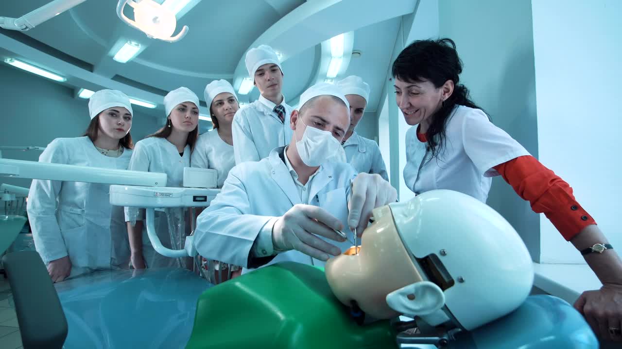 Stock Video Dental Students Watching A Dental Procedure Live Wallpaper For PC - Free Download