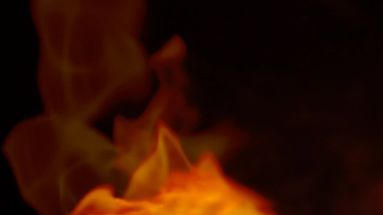 Stock Video Inlaid Flames Waving In The Dark Animated Wallpaper - Free Download
