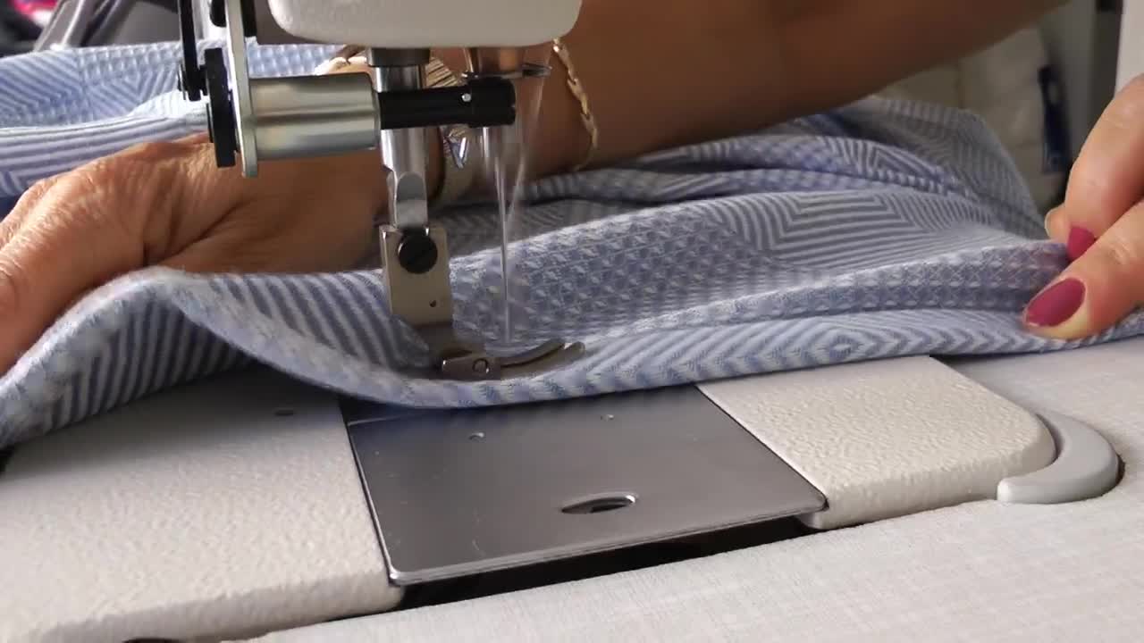 Stock Video Hands Of A Tailor Sewing A Dress Animated Wallpaper - Free Download