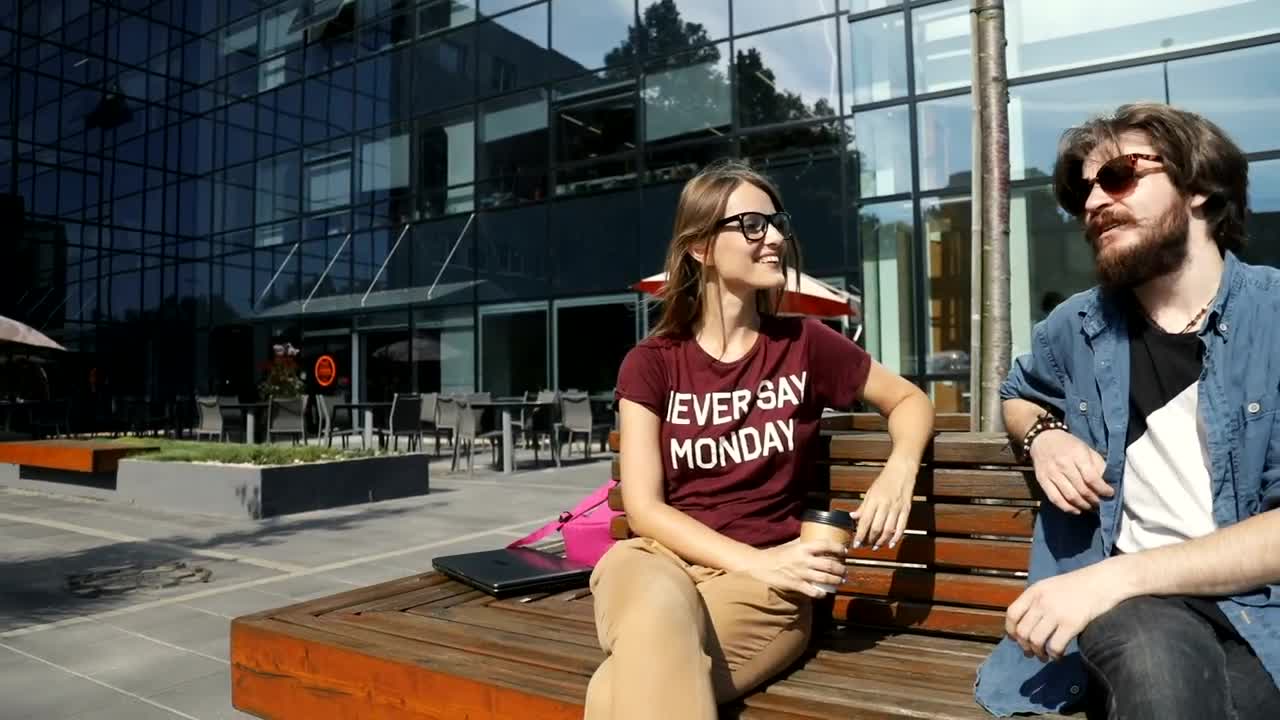 Stock Video Friends Chatting On A Bench In The City Live Wallpaper For PC - Free Download