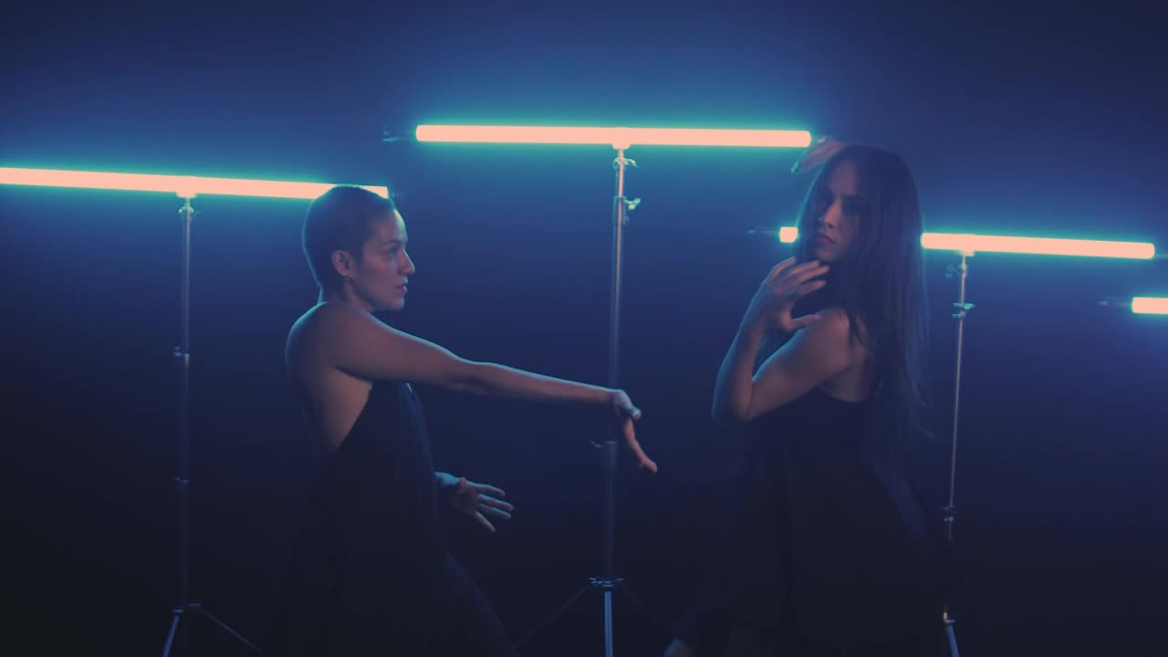 Free Stock Video Two Girls Dancing With Blue Neon Lights In The Background Live Wallpaper - Free Download