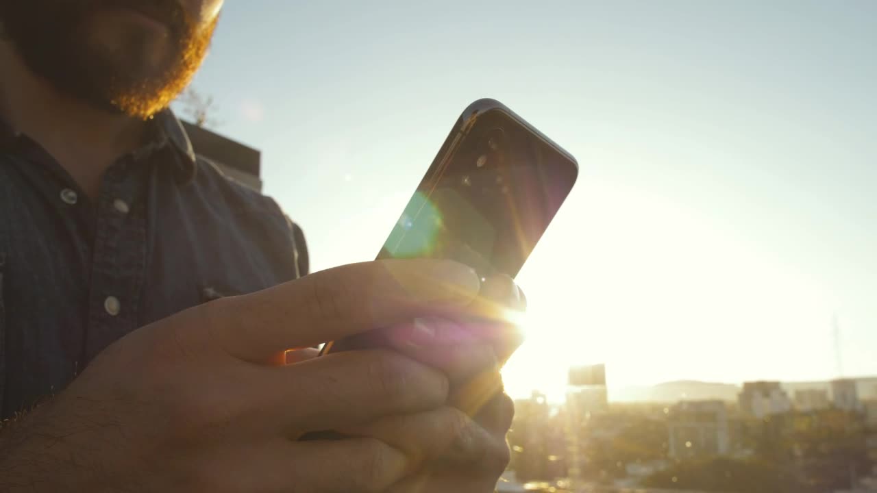 Stock Video Guy Texting At Sunset Live Wallpaper For PC - Free Download