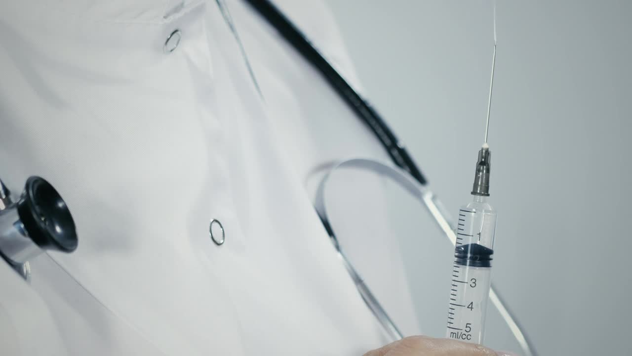 Stock Video Doctor Holding A Syringe Live Wallpaper For PC - Free Download
