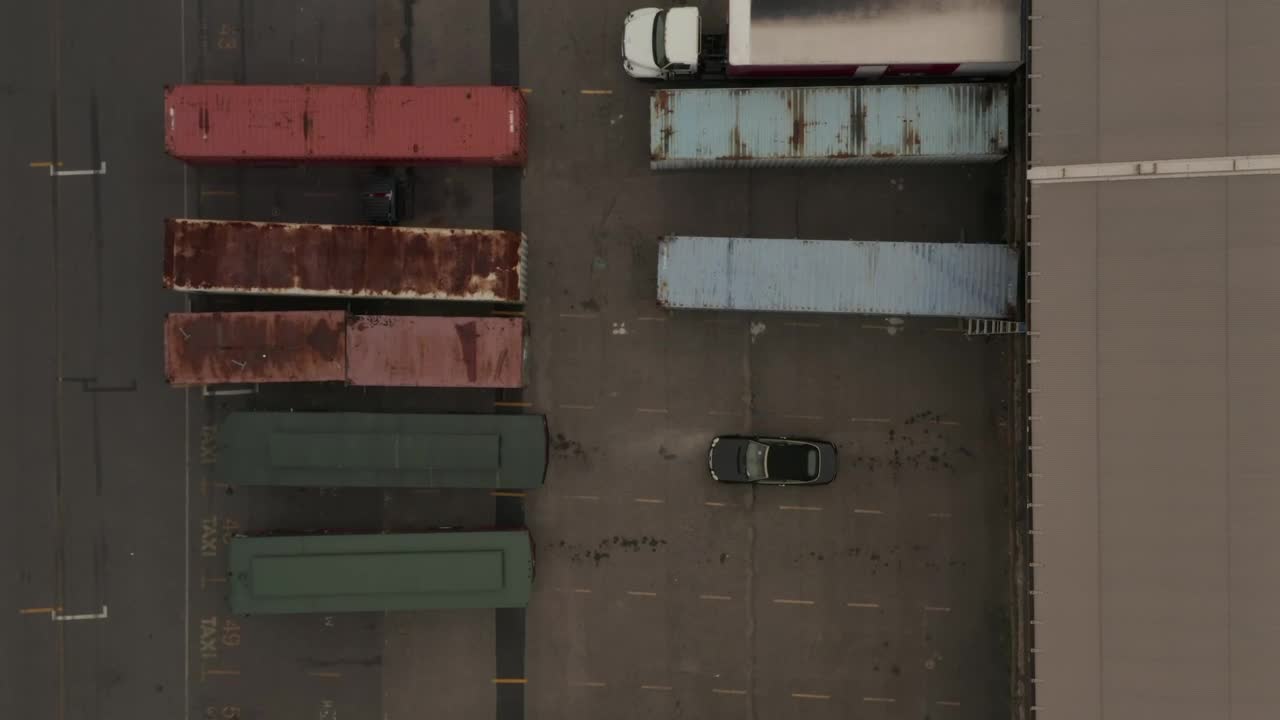 Free Video Stock trailers parked outside a warehouse Live Wallpaper - Free Download