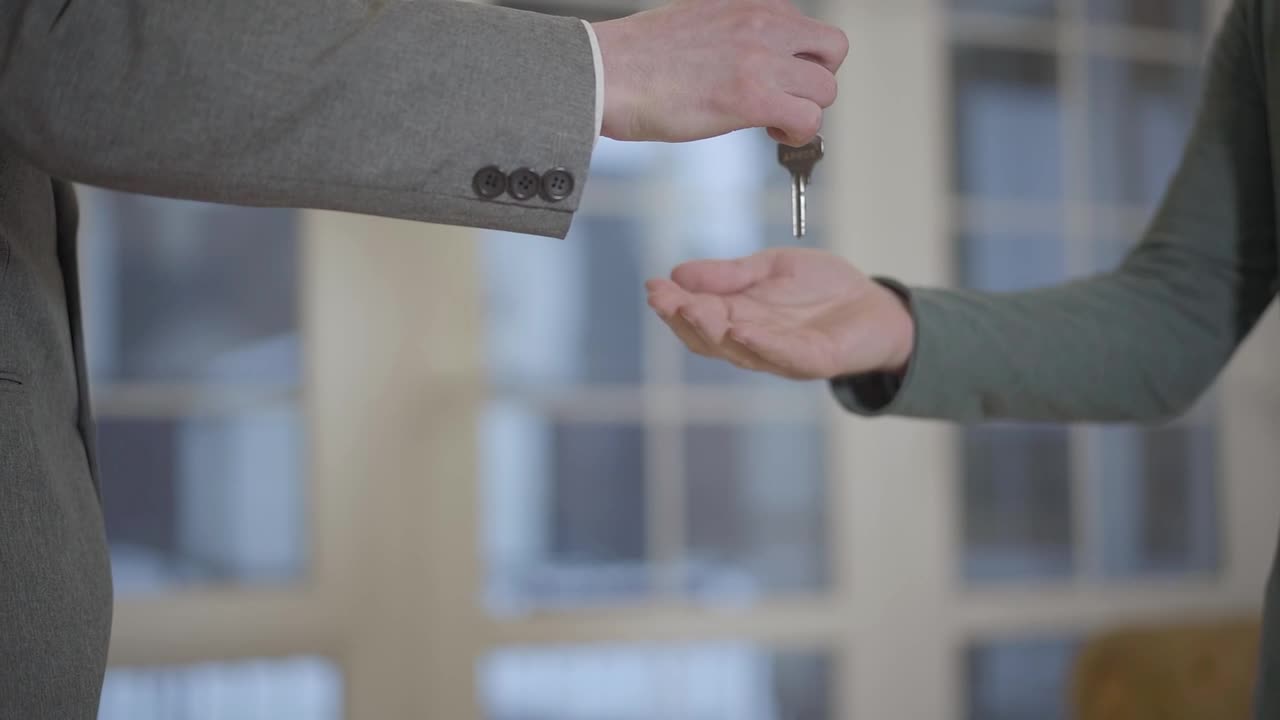 Free Video Stock Slow Motion Offer Of House Key And Handshake Live Wallpaper - Free Download