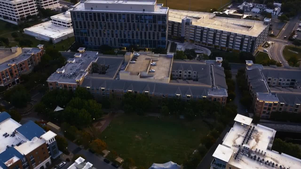 Stock Video Flying Over A City With Buildings And A Huge Park Live Wallpaper For PC - Free Download