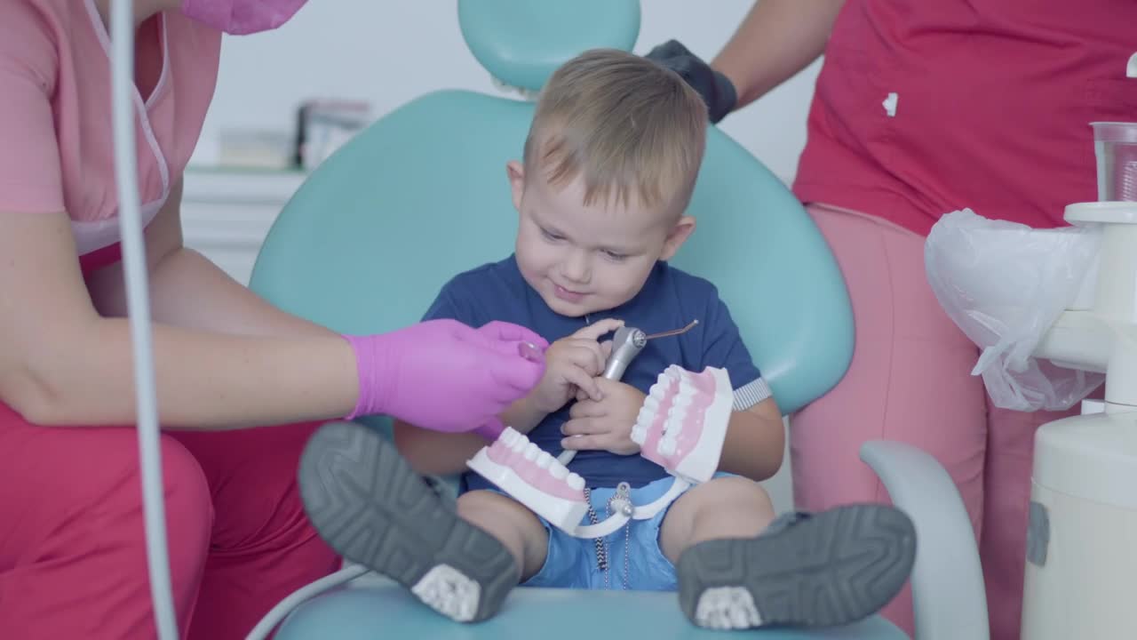 Video Stock Playful Boy In Consultation With The Dentist Live Wallpaper Free - Free Download