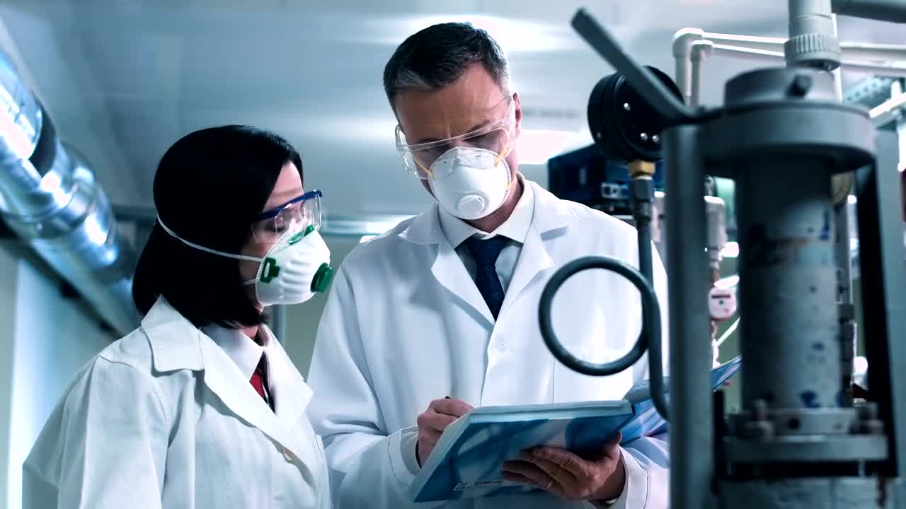 Free Stock Video Scientist Taking Notes From Lab Equipment Live Wallpaper - Free Download