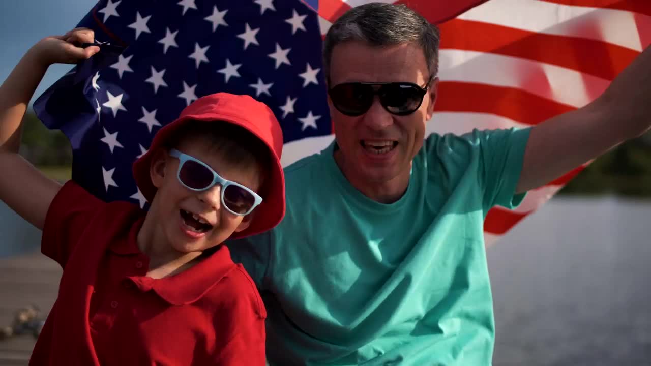 Stock Video Father And Son Celebrating With An American Flag Live Wallpaper For PC - Free Download