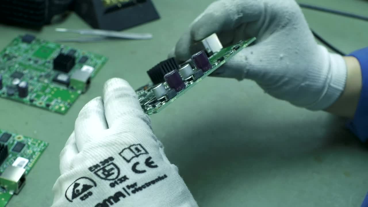 Video Stock Quality Check Of A Circuit Board Live Wallpaper Free - Free Download