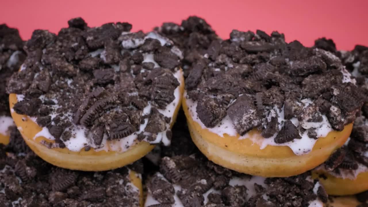 Free Video Stock Stacking A Tower Of Donuts With Cookie Chunks Live Wallpaper - Free Download