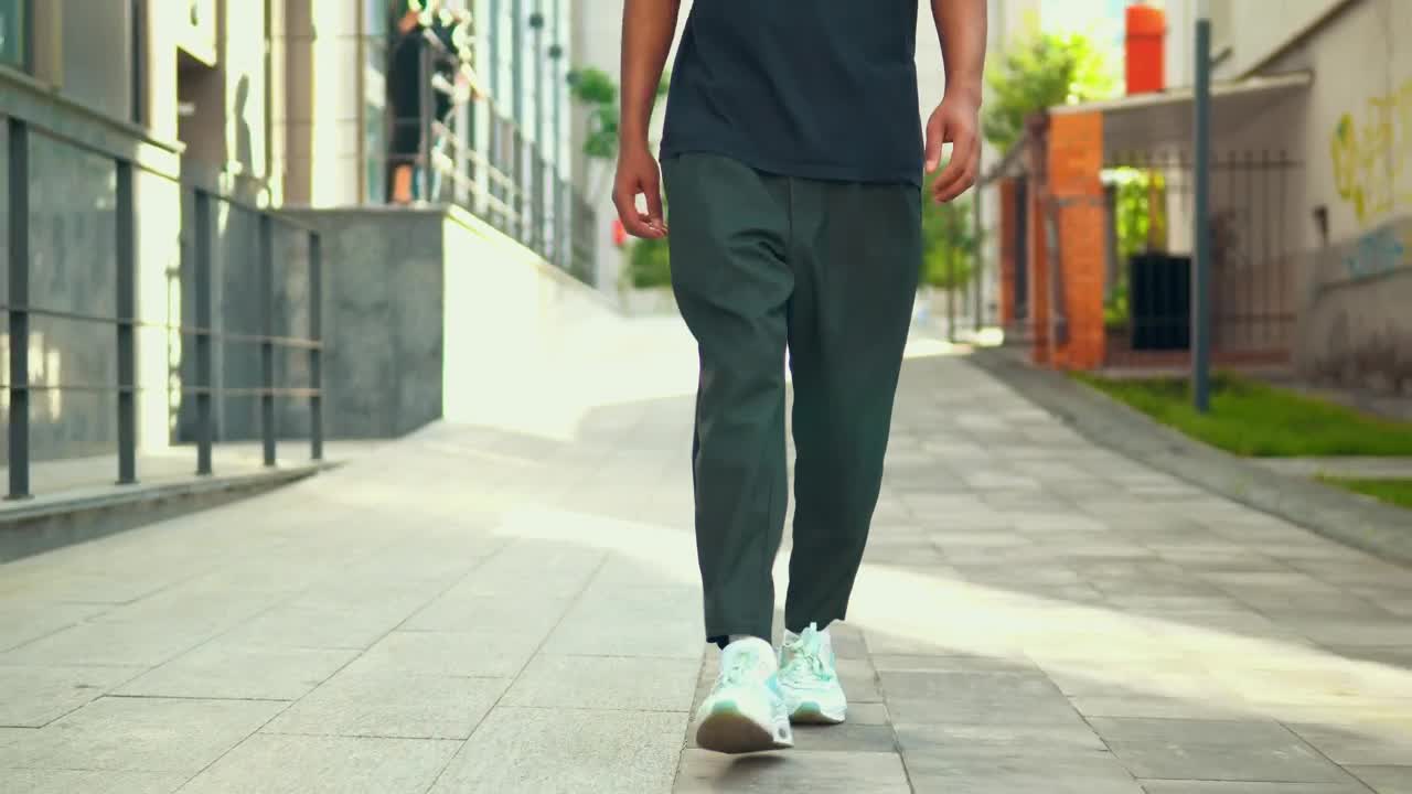 Stock Video Footsteps Of A Young Man Walking Down The Street Live Wallpaper For PC - Free Download