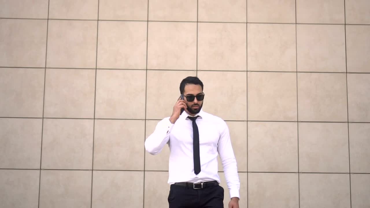 Stock Video Entrepreneur Man Talking On Cell Phone Live Wallpaper For PC - Free Download