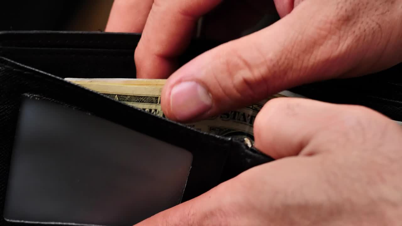 Stock Video Man Searching For A Banknote In His Wallet Close U Animated Wallpaper - Free Download