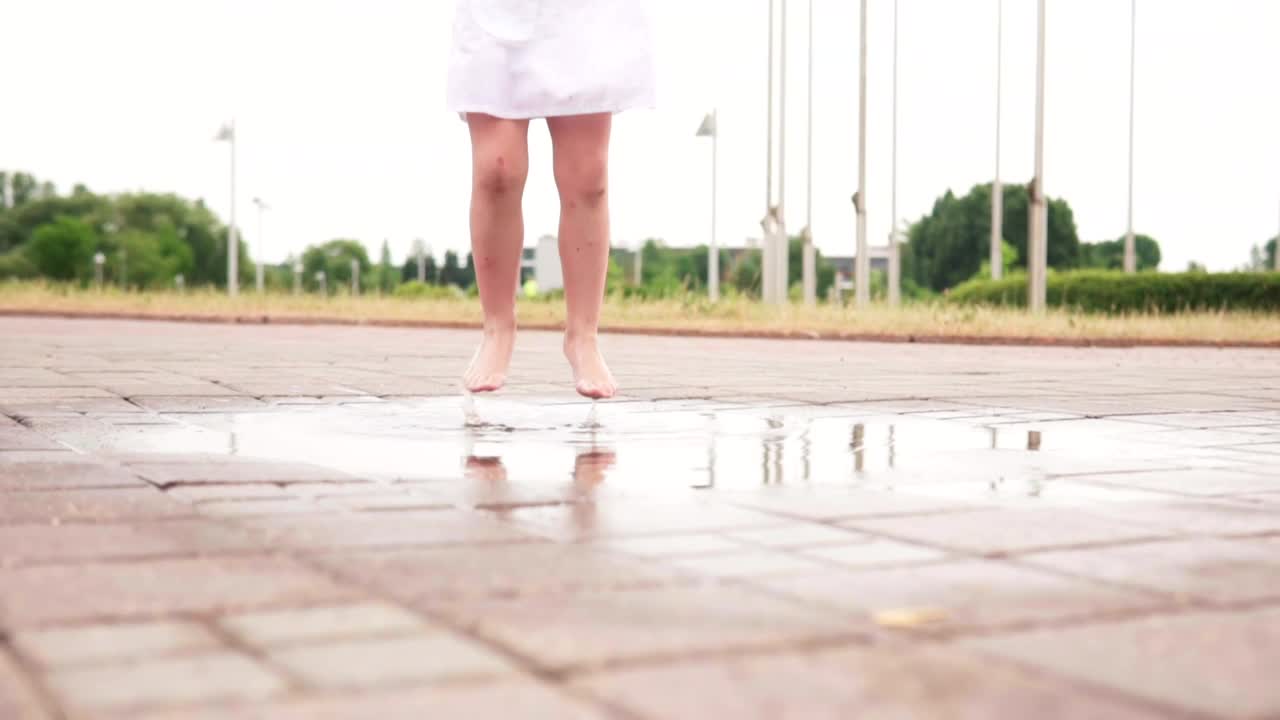 Free Video Stock toddler jumping in a puddle Live Wallpaper - Free Download