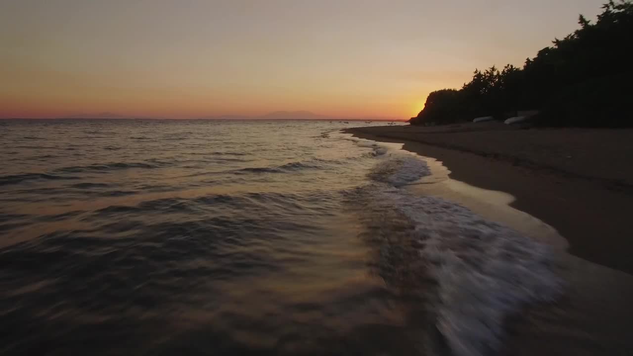 Free Video Stock sunset appearing behind the corner Live Wallpaper - Free Download