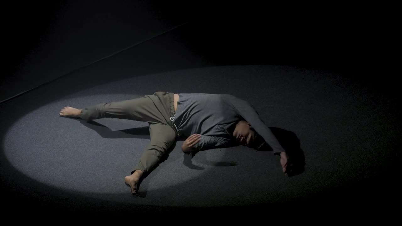 Stock Video Man Doing Floor Performance In The Dark Animated Wallpaper - Free Download