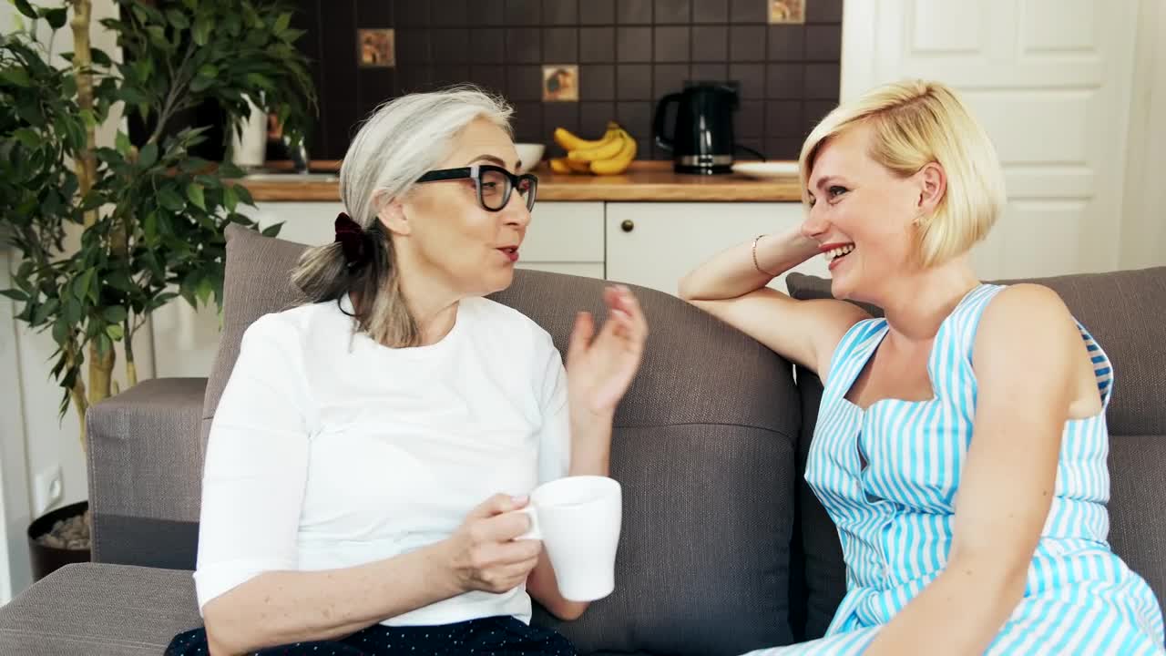 Stock Video Mother And Daughter Talking In Their Living Roo Animated Wallpaper - Free Download