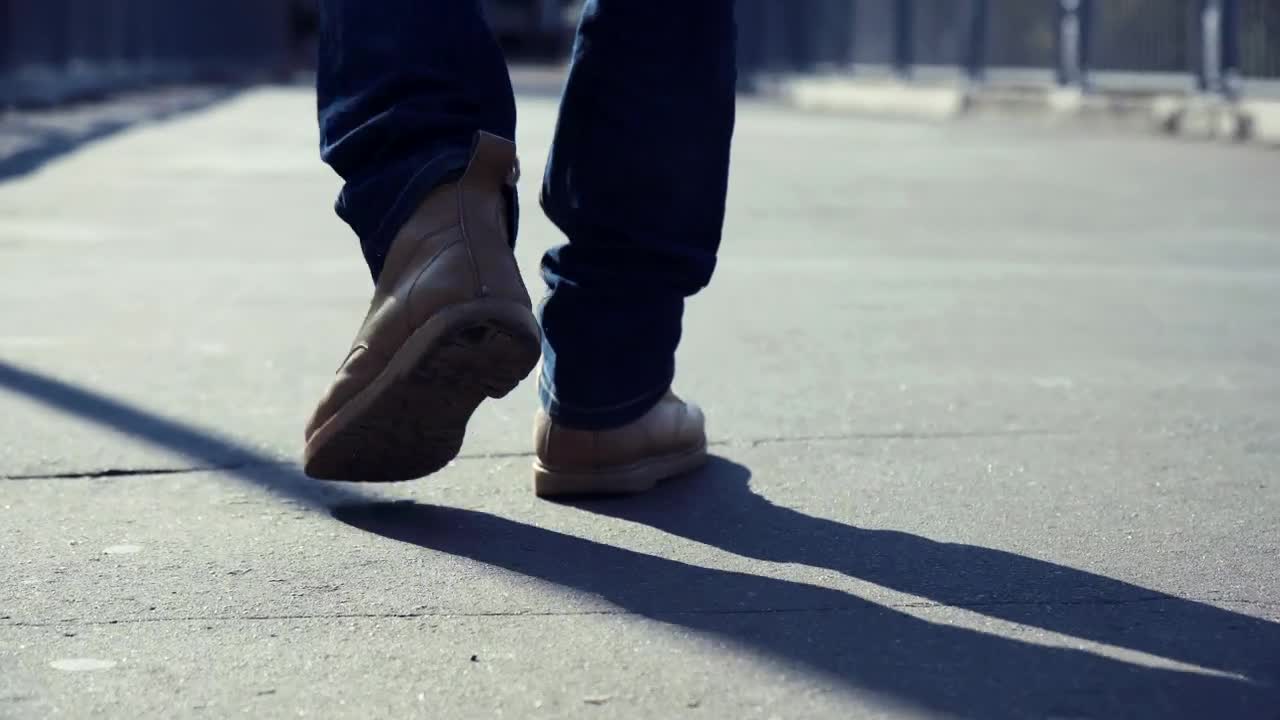 Stock Video Man Walking On The Concrete Sidewal Animated Wallpaper - Free Download
