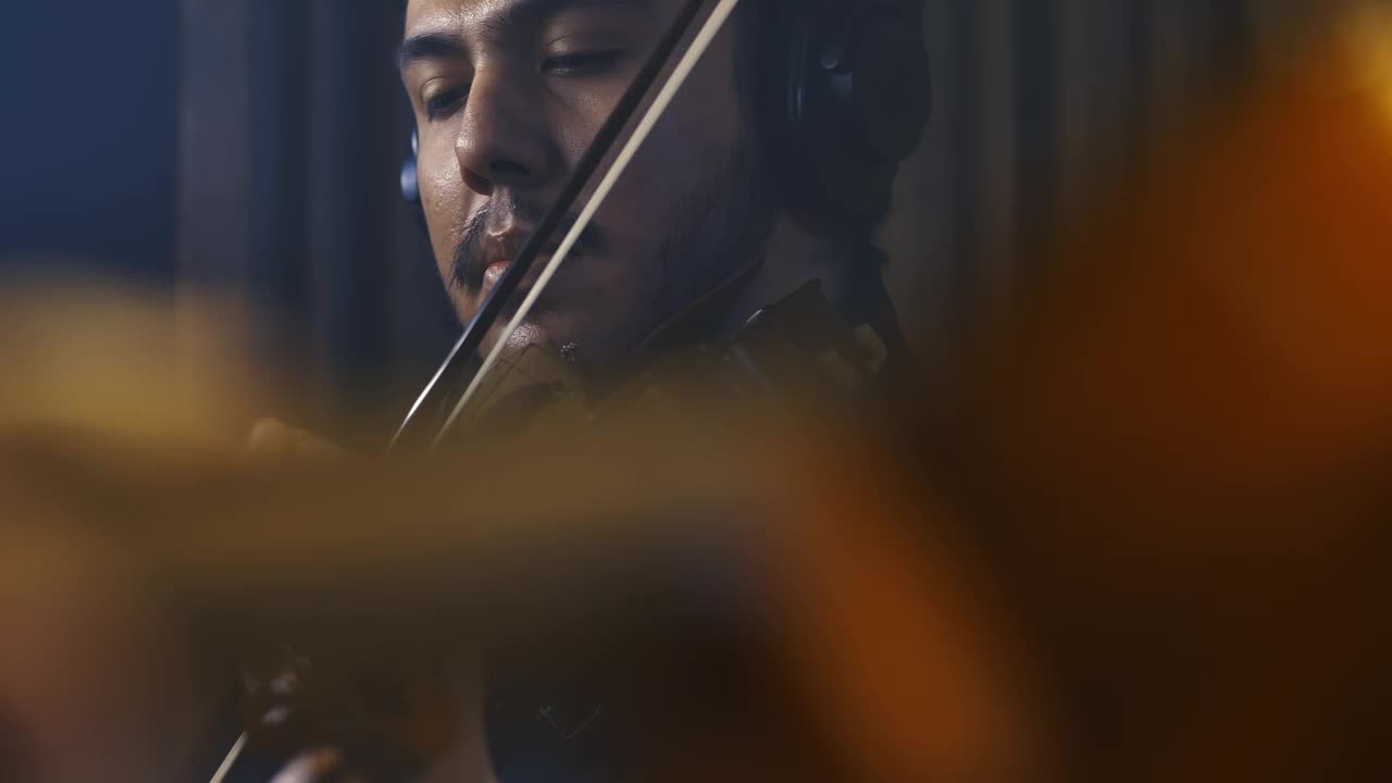 Stock Video Face Of A Violinist Playing In A Recording Studio Live Wallpaper For PC - Free Download