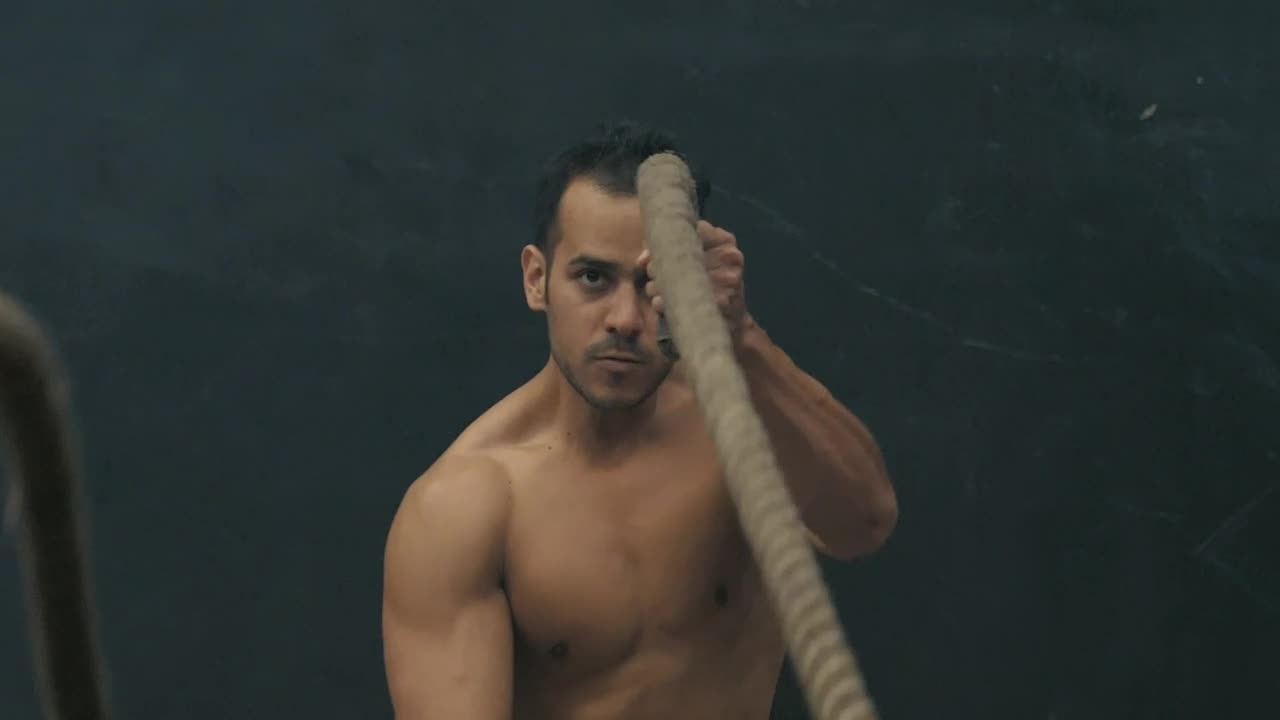Stock Video Man Doing Rope Exercise Animated Wallpaper - Free Download