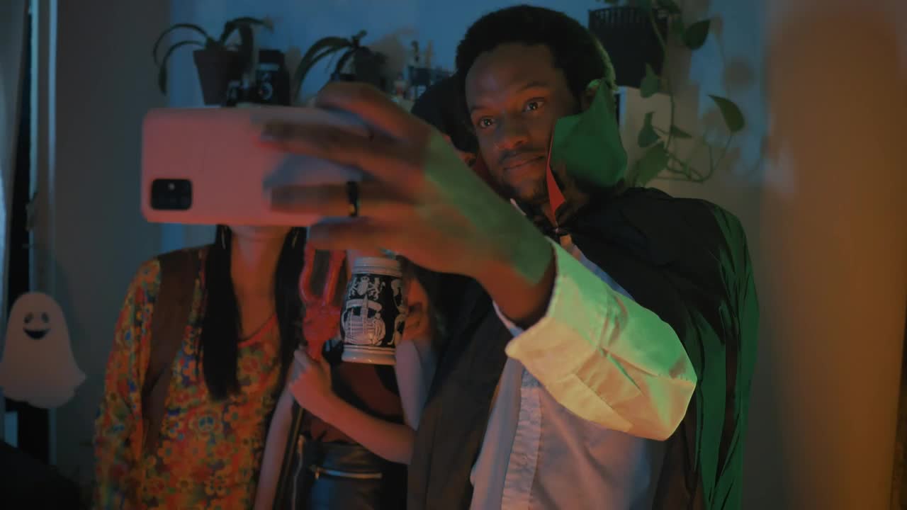 Stock Video Friends Taking A Selfie At A Costume Party Live Wallpaper For PC - Free Download