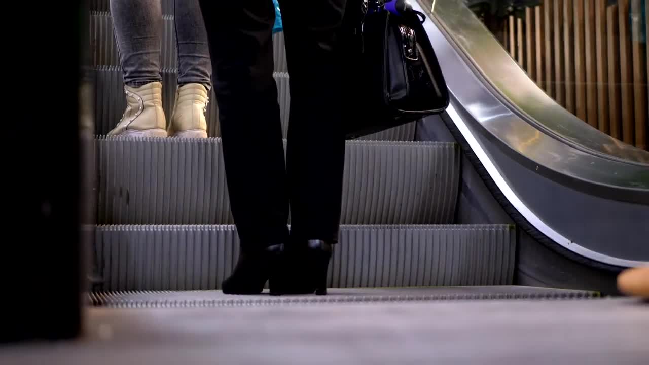 Stock Video People Boarding The Escalator Live Wallpaper - Free Download