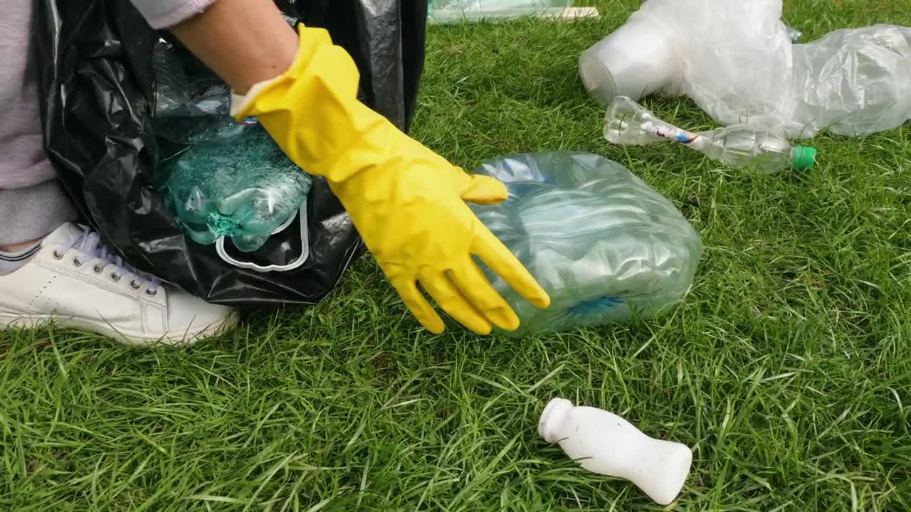 Stock Video Collecting Plastic Garbage From The Ground Live Wallpaper For PC - Free Download