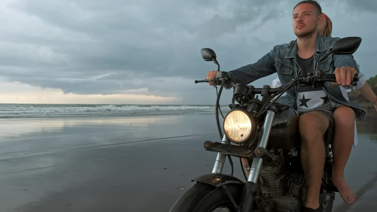 Stock Video Man With His Girlfriend Riding Motorcycle On Beac Animated Wallpaper - Free Download