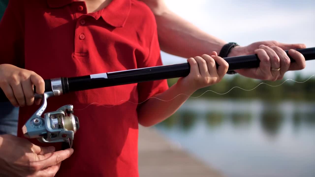 Free Video Stock teaching a kid how to fish in the lake Live Wallpaper - Free Download