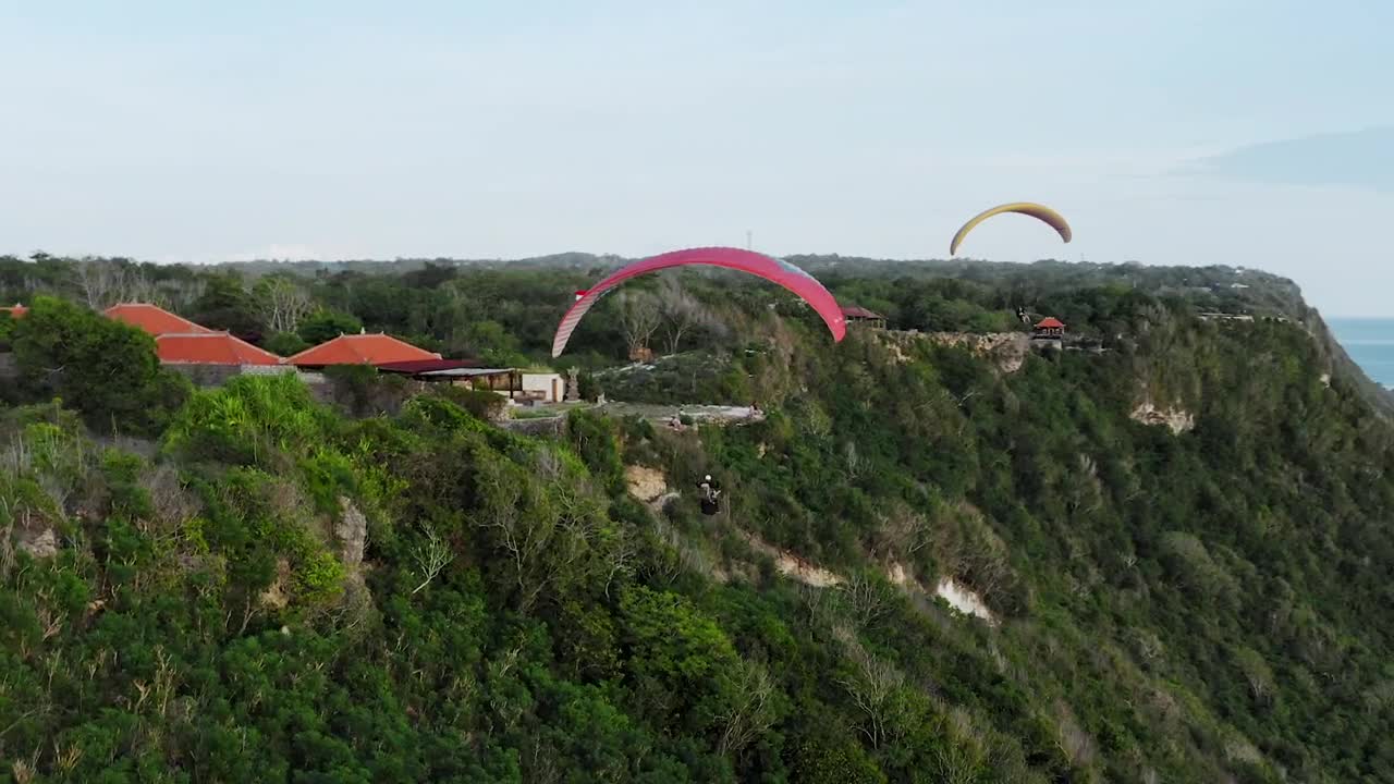 Stock Video Paragliding Over South Coast In Bali Indonesia Live Wallpaper - Free Download