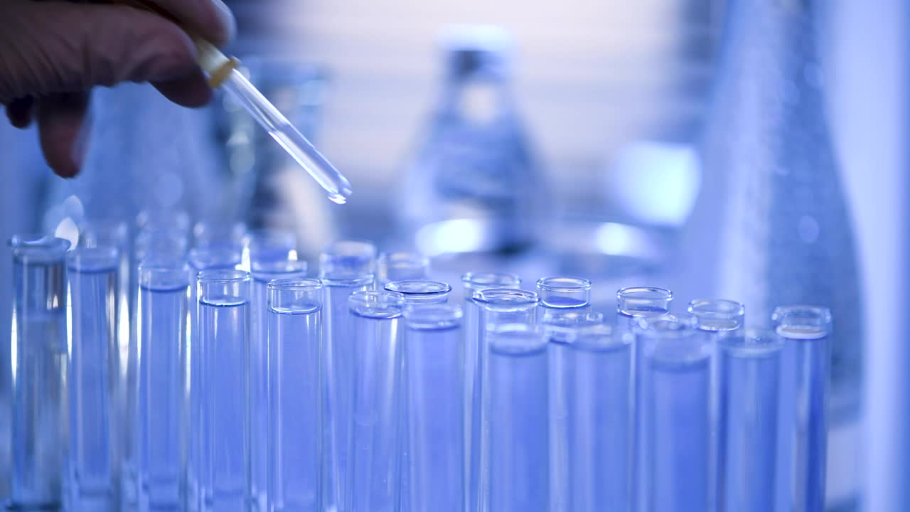 Stock Video Dropping Water On Laboratory Tubes Live Wallpaper For PC - Free Download