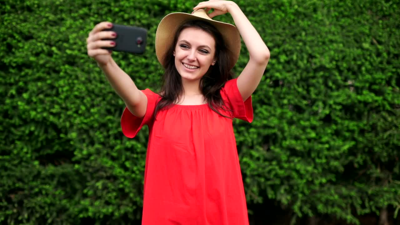 Stock Video Funny Girl Taking Selfies Wearing A Red Dress Live Wallpaper For PC - Free Download