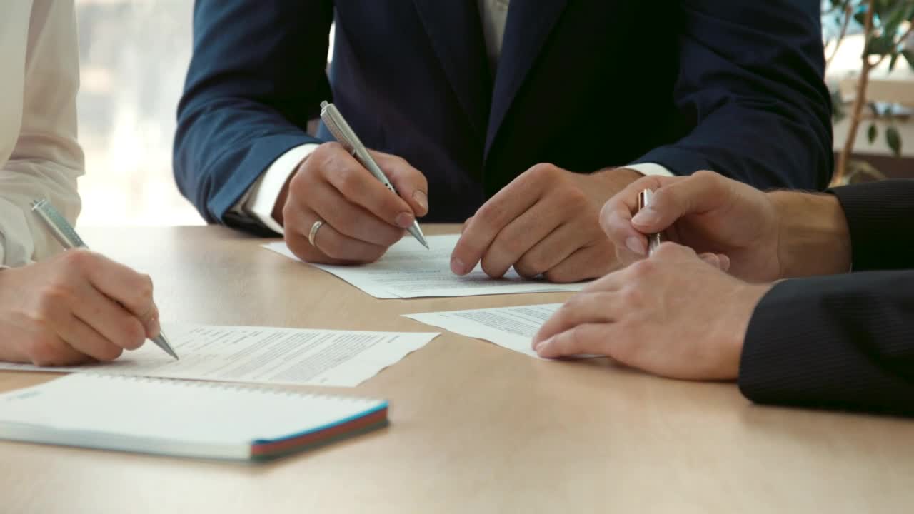 Free Video Stock three persons signing contracts Live Wallpaper - Free Download