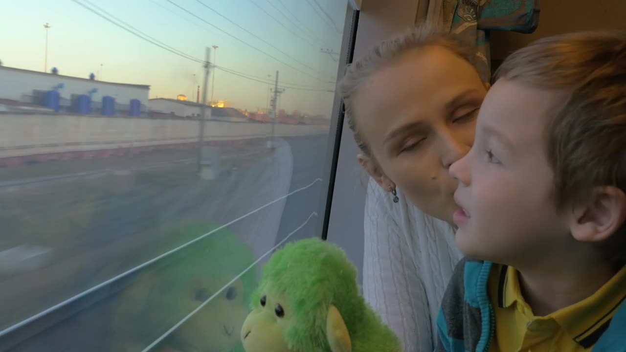 Stock Video Mother And Child Sharing A Train Journe Animated Wallpaper - Free Download