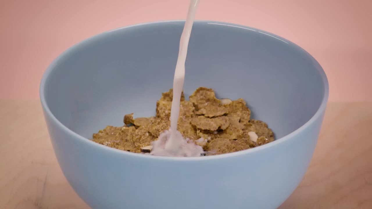 Free Video Stock Small Bowl With Cereal While They Serve You Milk Live Wallpaper - Free Download