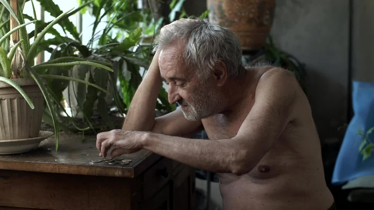 Stock Video Old Poor Man Counting Coins Live Wallpaper - Free Download