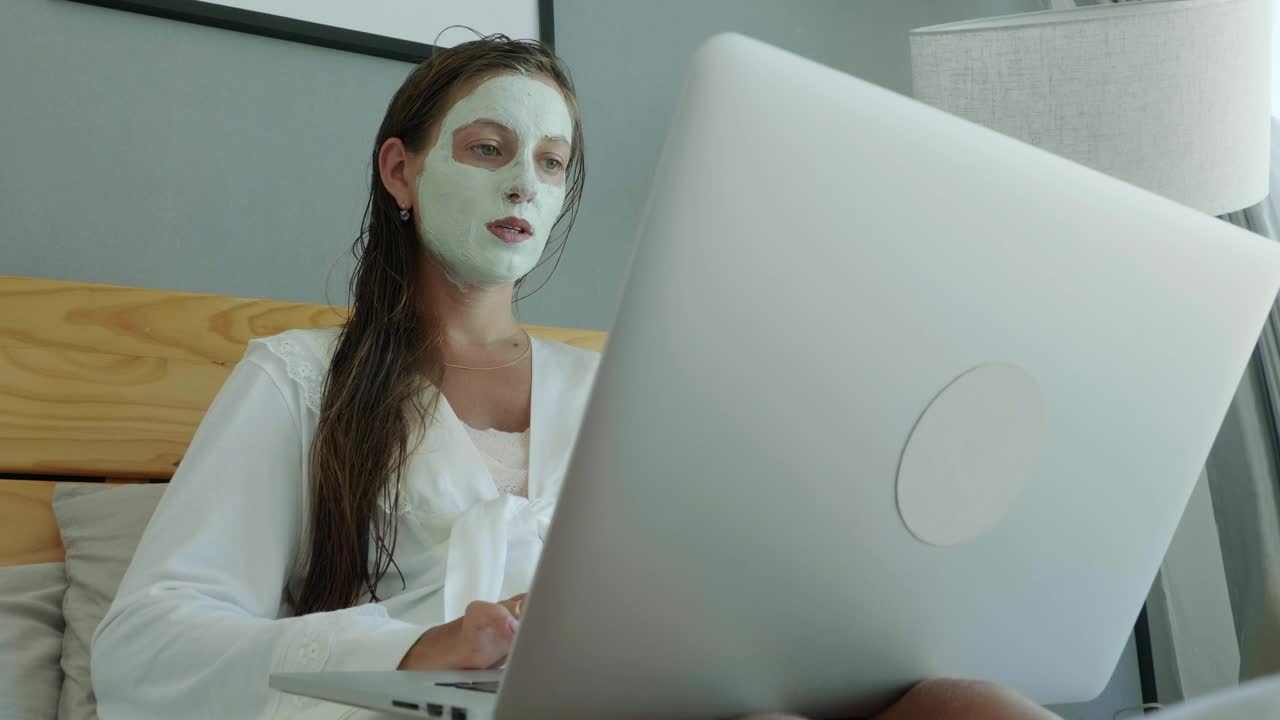 Free Stock Video Woman Working On The Bed With A Beauty Face Mask Live Wallpaper - Free Download