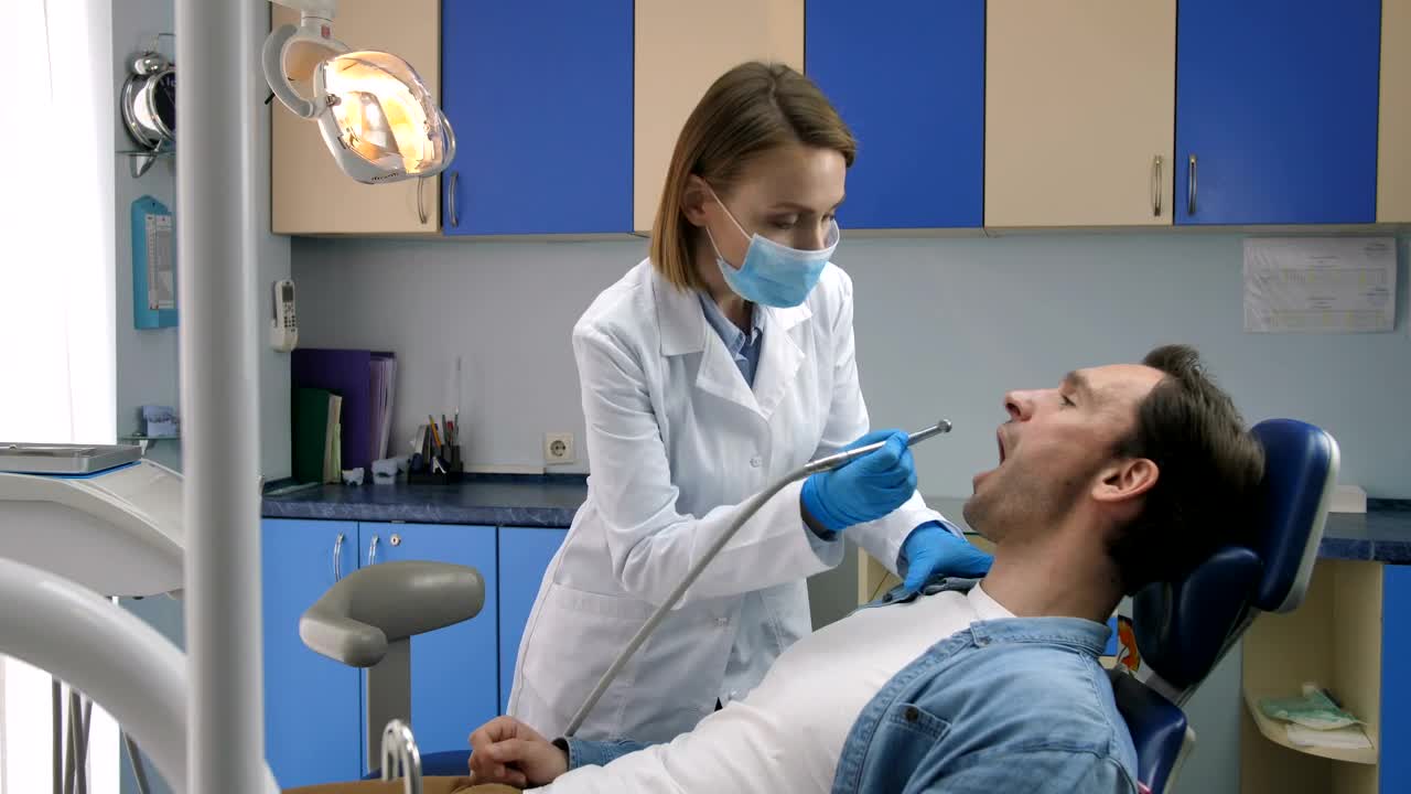 Free Video Stock tooth decay treatment at the clinic Live Wallpaper - Free Download