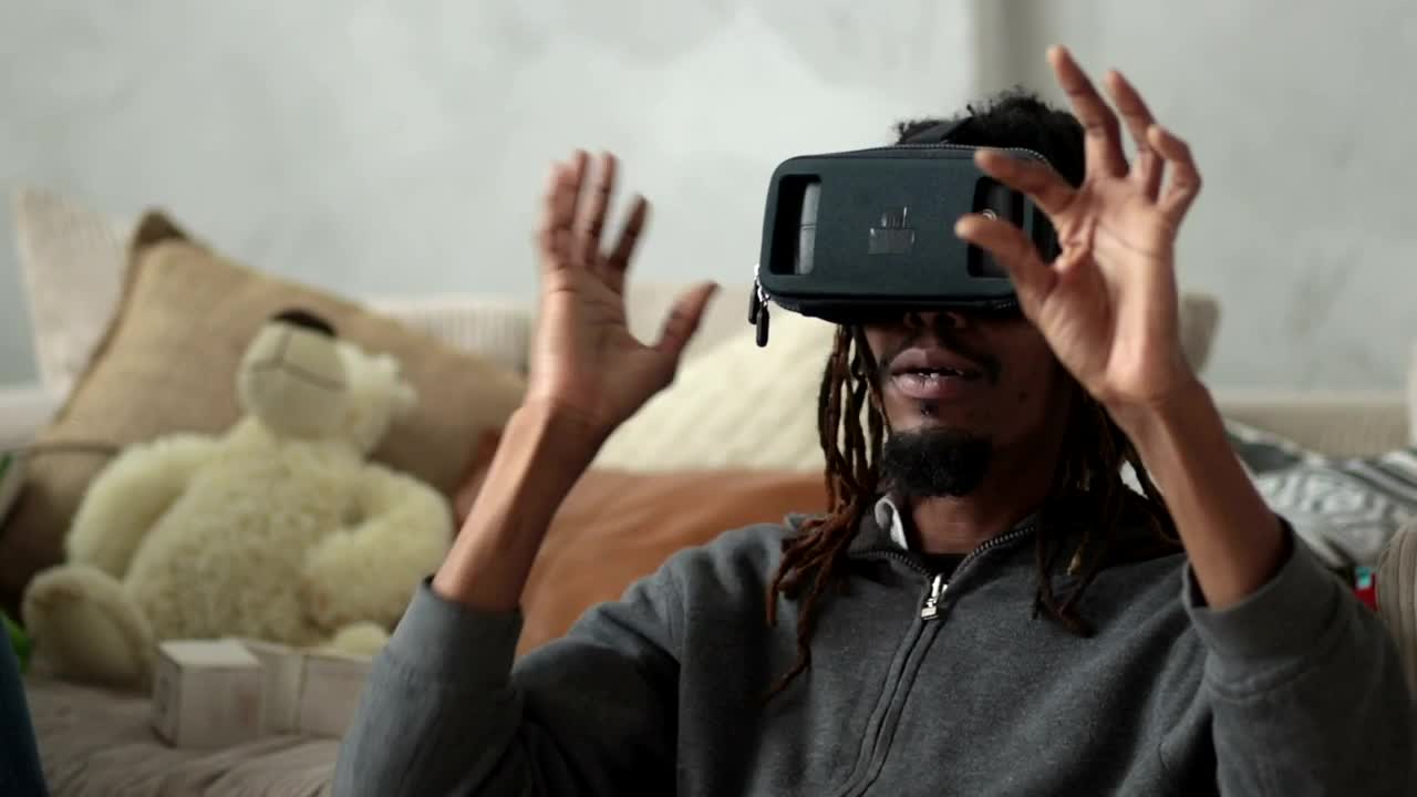 Stock Video Man With Vr Glasses Doing Commands With His Hand Animated Wallpaper - Free Download