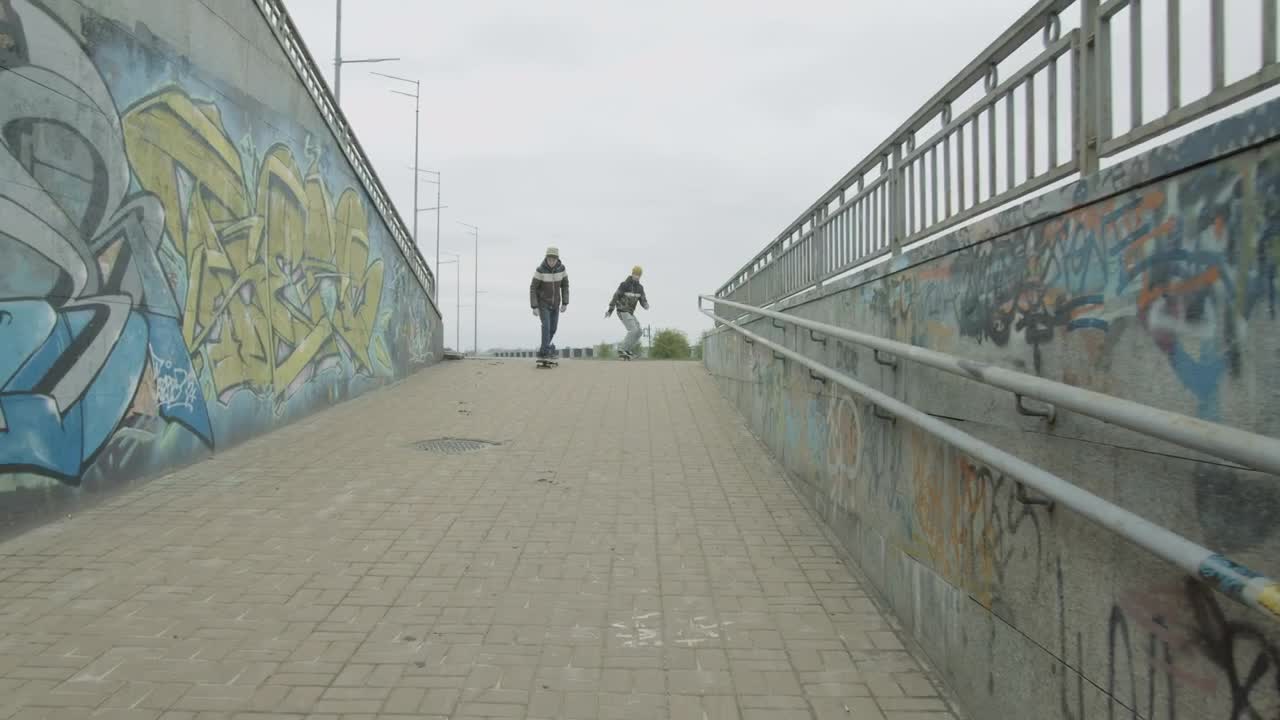Free Video Stock Skateboarders In An Urban Area With Graffiti Live Wallpaper - Free Download