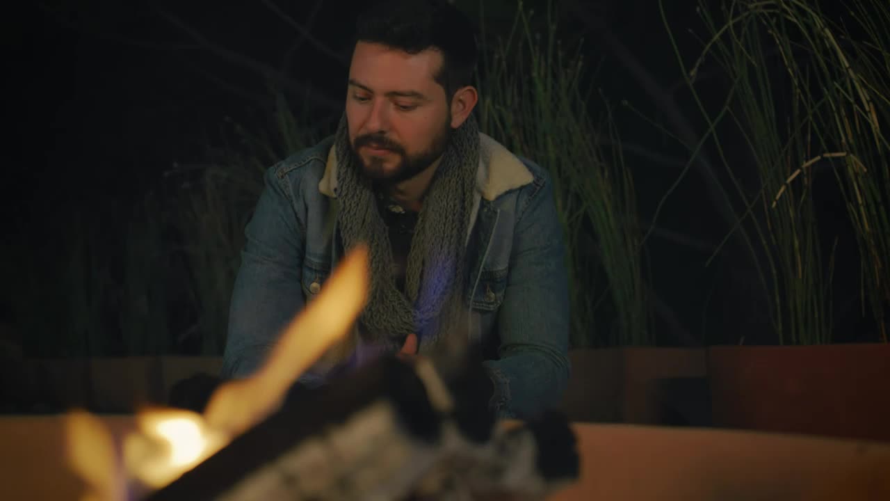 Video Stock Portrait Of A Man Warming His Hands By A Campfire Live Wallpaper Free - Free Download