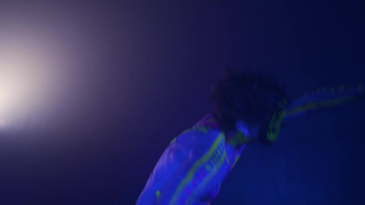 Stock Video Energetic Dance Of A Boy With A Neon Mask Live Wallpaper For PC - Free Download