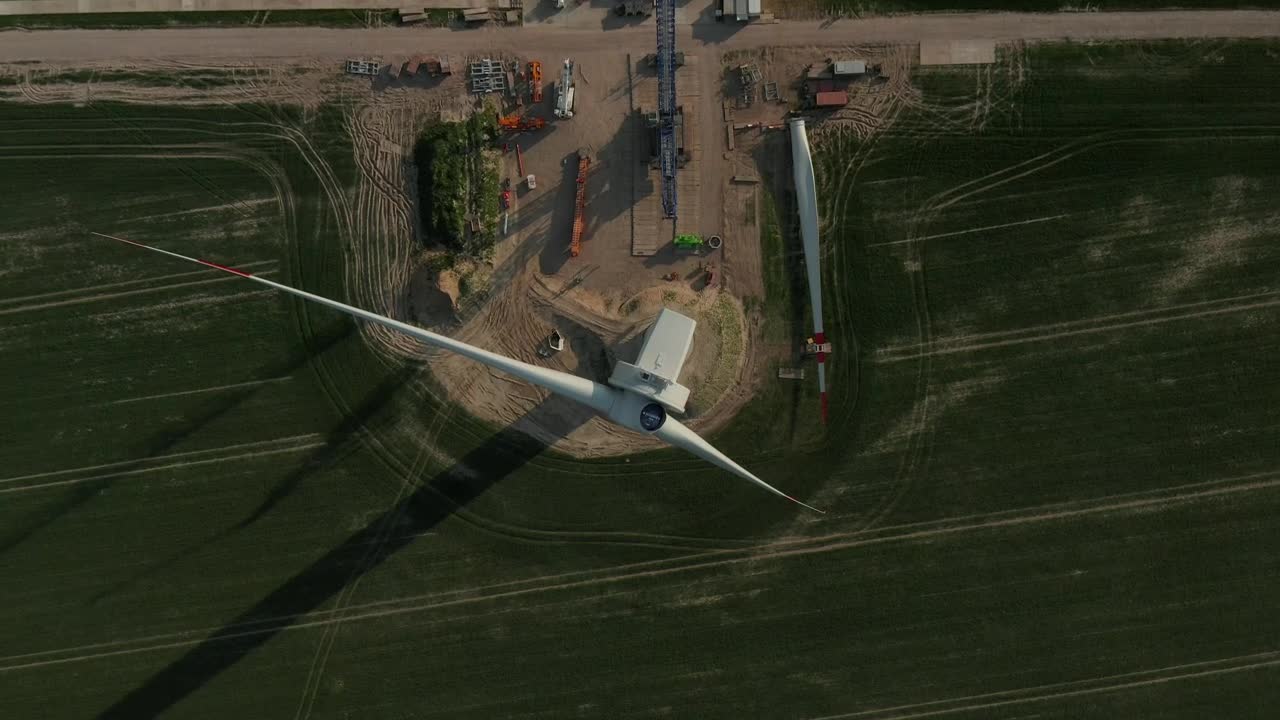 Stock Footage Wind Turbine Under Repair Aerial View Live Wallpaper - Free Download