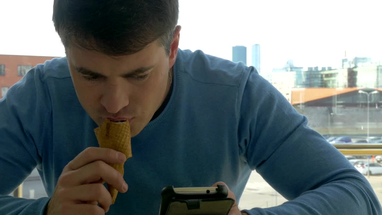 Free Video Stock texting while eating an ice cream Live Wallpaper - Free Download