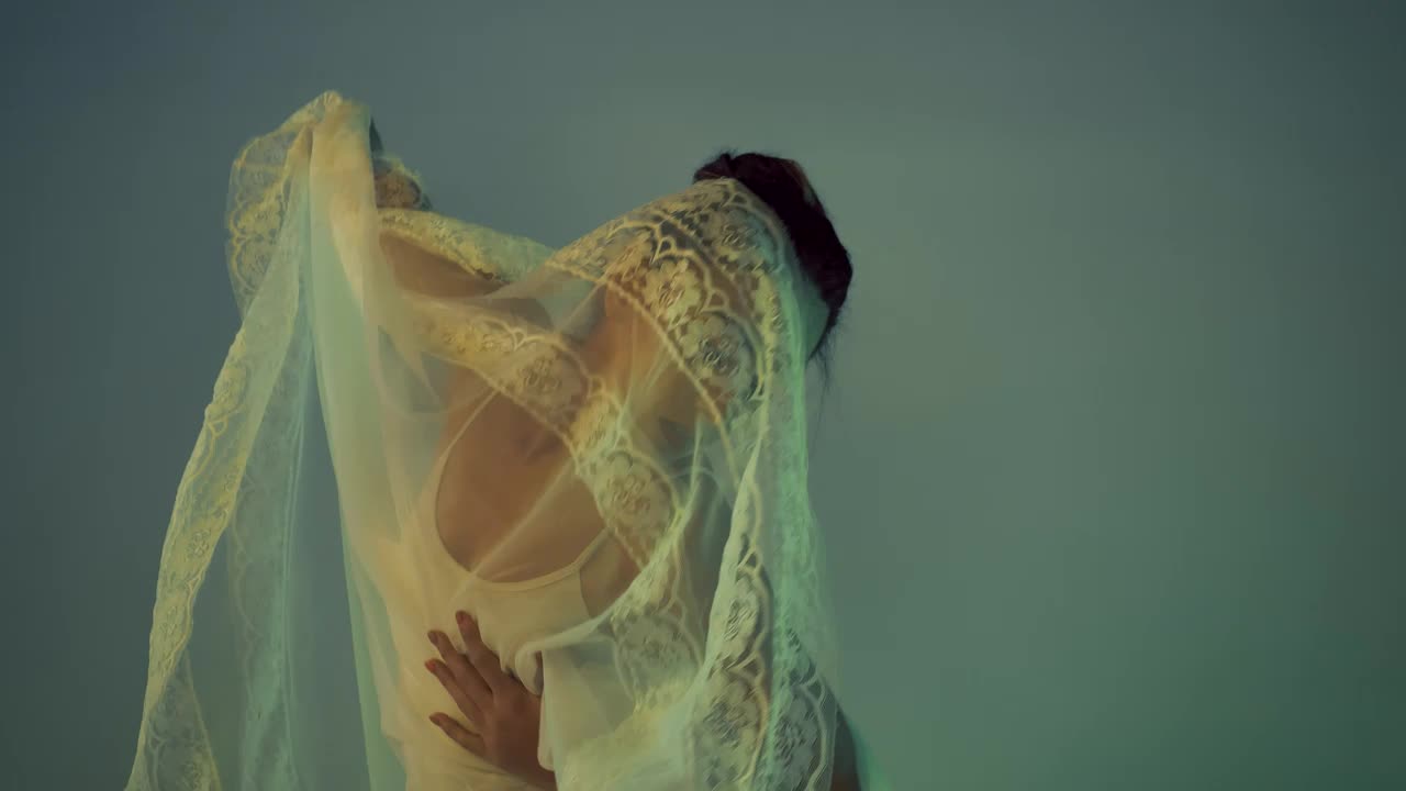 Stock Video Dancer Moving With Her Body Under A Veil Live Wallpaper For PC - Free Download